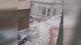 Heavy rain and hail turn streets into rivers in Spain