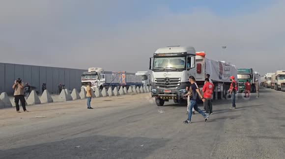 More than 100 aid trucks enter Gaza from Egypt via Rafah crossing - Buy ...