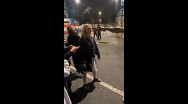 Duck under the arm prank: Woman ducks blindly for one minute while man walks off