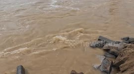 China: Emergency repair of damaged highway, riverbank well underway following heavy rain