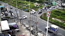 Female driver accidentally crashes car into food shop after pickup truck hits her at intersection