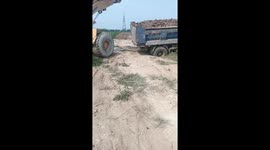 Loader truck falls into river during loading mishap in Tianjin, China