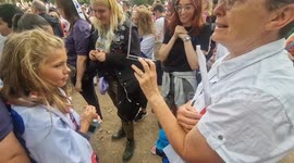 Practical solution: Lionesses supporter produces radio when speakers fail during stage appearances in the Mall
