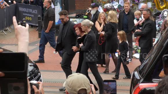 Sharon looks distraught as Ozzy Osbourne’s funeral cortege passes through Birmingham city centre
