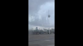 Steel structure perfectly reflected in clouds at Beilun Dock in Zhejiang, China
