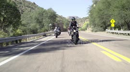 Harley rider attempts a seat ride and wipes out! Bike slides hundreds of feet - 4k