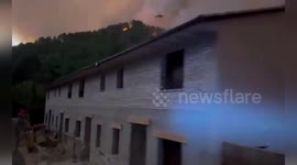 Spain: Firefighters Defend Homes And Rescue Family Amid Blaze In El Arenal