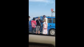 Passerby helps tourists retrieve their keys from locked car