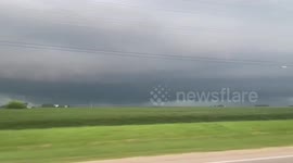 US: Storm Clouds Roar Over Streeter In Intense Weather Scene