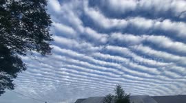 Australia: Altocumulus Clouds Appear Over Brisbane, Signaling Weather Shift