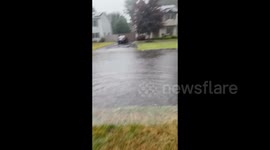 US: Deivery Truck Navigates Flash Flood in Islip, NY