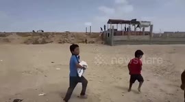 Gazan Boy Rejoices Over Precious Flour Bag