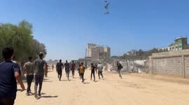 Palestinians risk their lives for airdropped aid in Gaza amid deepening hunger crisis