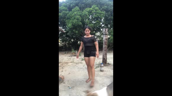 Daughter Imitates Mom Doing Squats