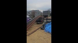 Metal beam unloading mishap leads to unexpected damage to truck bed