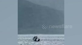 Video shows passengers waving for help as boat sinks