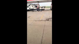 Trailer appears stuck at gas station in Alexander, North Dakota