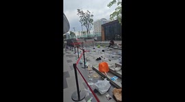 Locals leave their belongings on floor to reserve spots in queue at book festival