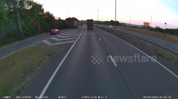 Terrifying moment car wiped out after attempting dangerous overtake of huge truck on UK motorway