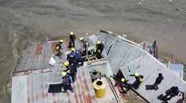 Devastating floods causing widespread building collapses, officials deploy dog squads as modern equipment accelerate search for missing persons