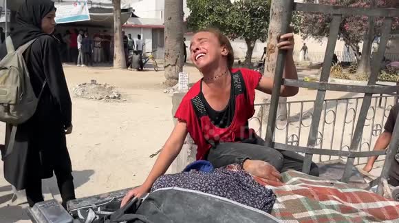 Palestinian girl mourns mother killed in Israeli strike on Gaza - Buy ...