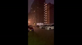 Japan: Man Pushes Car Stranded in Floodwater in Kumamoto