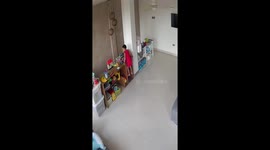 Father teaches son safe climbing skills in Davao, Philippines