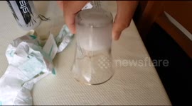 Nappy powder makes water 'stick' to the bottom of a glass
