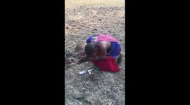 Maasai man demonstrates how to make fire without matches