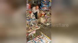 Newsflare Edit - Cute dog Vicki takeing payments for his handicapped owner!