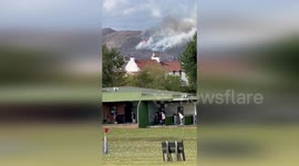 UK: Golfers Continue Playing As Fire Burns On Arthur's Seat In Edinburgh