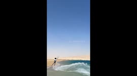 Kitesurfer performs aerial stunts in Nekhel, Egypt