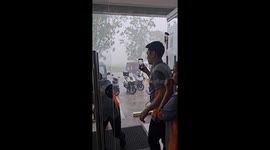 Powerful winds and heavy rain batter Quezon City in Philippines