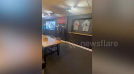 Staff shocked after car flips upside down and crashes through gym window