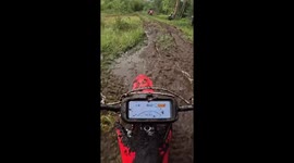 Motorcycle gets stuck in thick mud in Sundsvall, Sweden