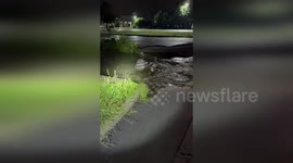 US: Severe Flooding Engulfs Menomonee Falls Streets At Night