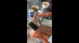 Tot tries to eat through glass—olive mishap charms 141K viewers