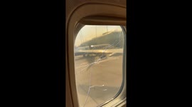 Not a good start! Lads flying to Ibiza find massive crack in plane's window