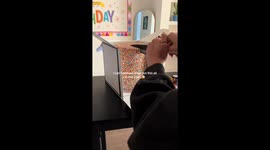 3 million viewed sprinkle-coated cake cuts to candy-filled rainbow surprise