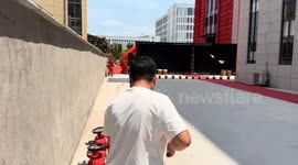 Man launches light-colored smoke firework during event in Zhejiang, China