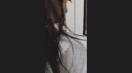 Kind visitor hands out bread to hospital patients in the Philippines