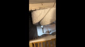 Incredible footage of snow hanging off roof after heavy weekend snowfall