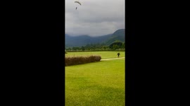 Skilled parachuter dodges colleague during rapid descent in Brazil