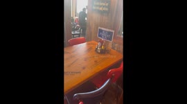 Man having an unexpected conversation in Santa Monica, California, USA