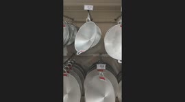 Bizarre! Woks Defy Physics in Mall: Unexplained Swinging Phenomenon