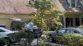 John Bolton returns to Bethesda residence after FBI search
