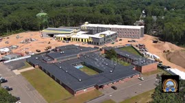 the new school will be replacing the old in the 2026 school year. the old building will be torn down and replaced by sports fields.