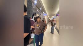 Shoppers flee as fire hits busy mall in Bangkok