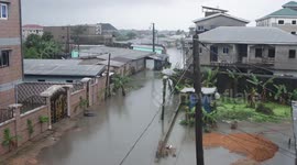 A wide early morning view of a flooded neighbourhood in Cameroon after rain at night
