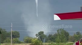 Tornado towers behind casino in Dakota